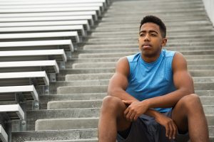 Young Man Struggling from Drug Abuse in Sports